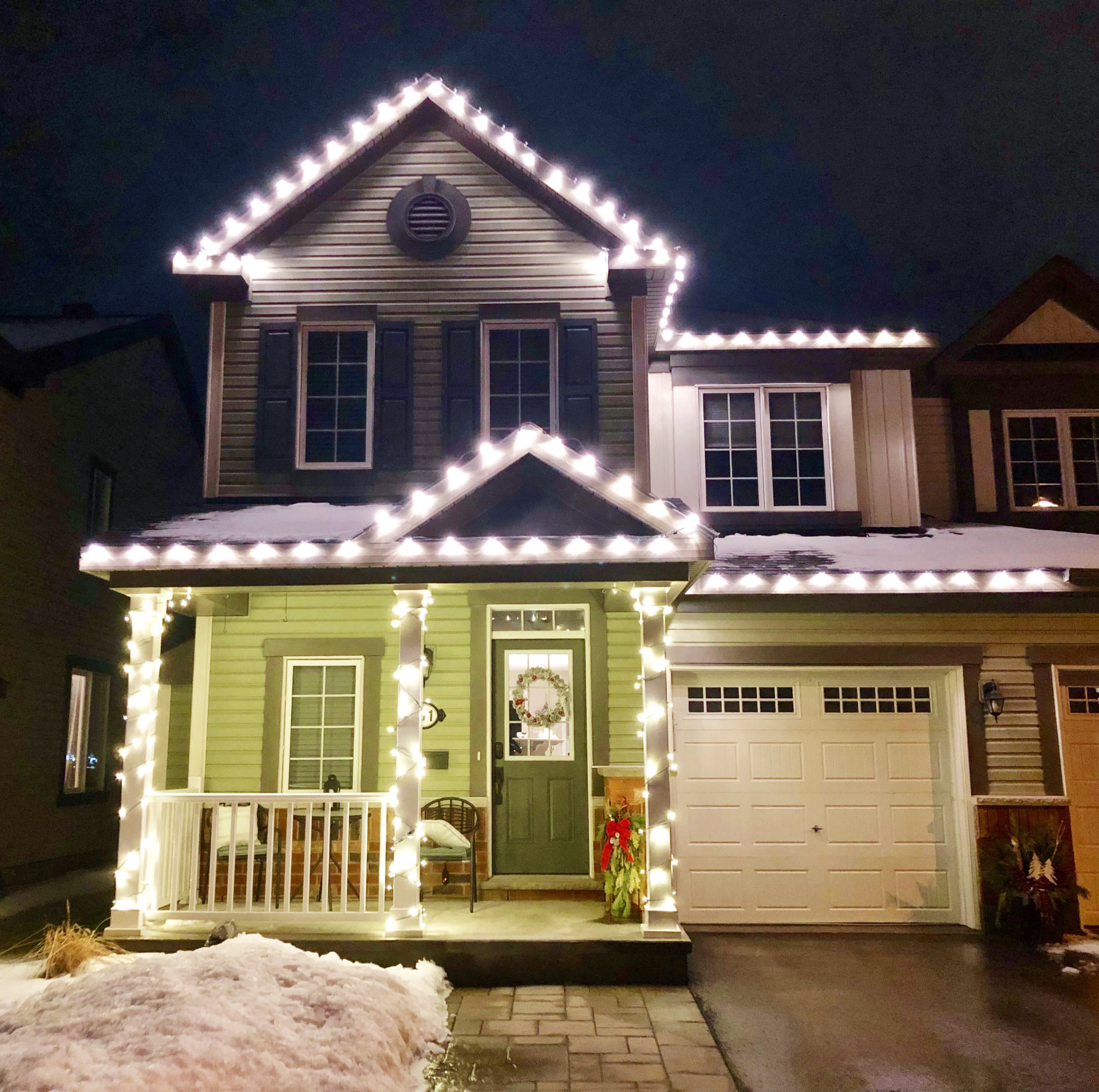 Warm-white roofline and wrapped porch columns